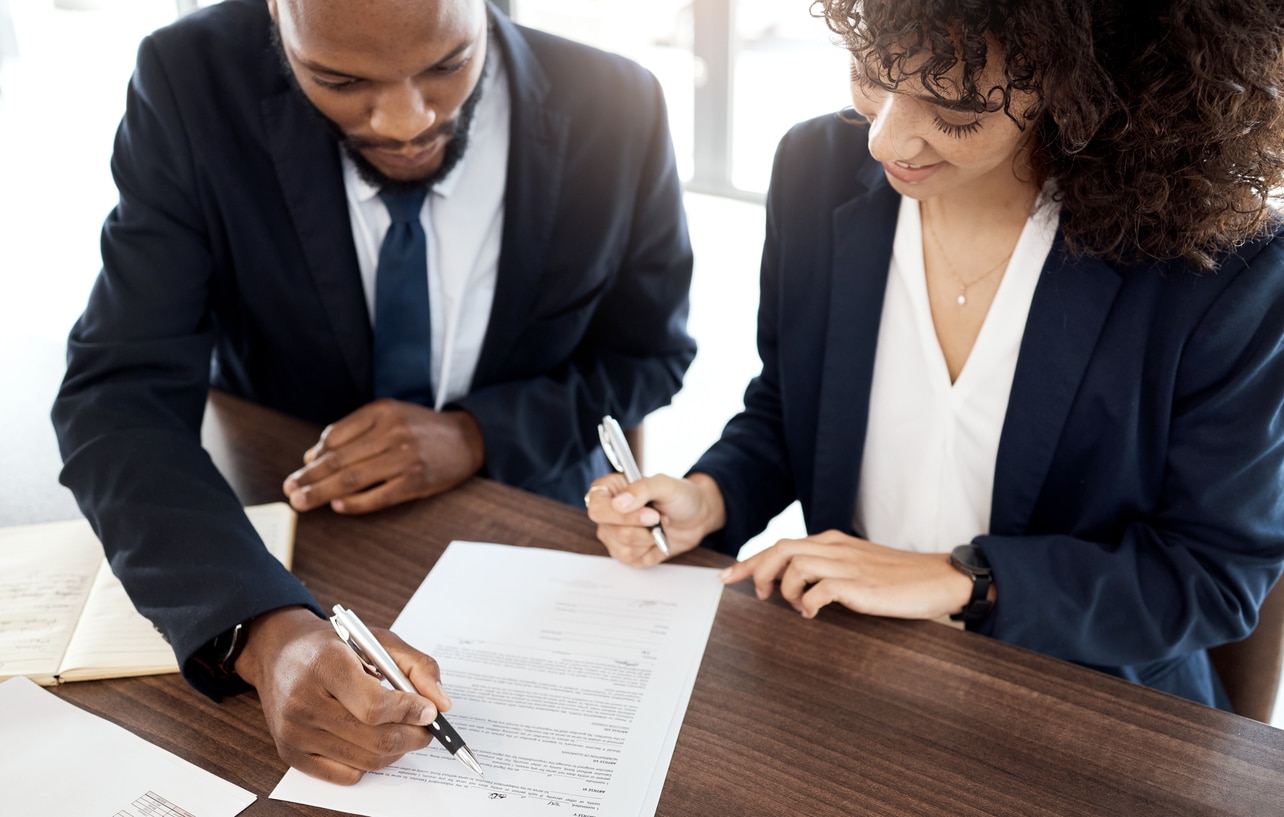 Top view, business team and people with contract, reading notes and planning company strategy\. Teamwork, financial consulting and analysis of documents, investment or legal paperwork of office review
